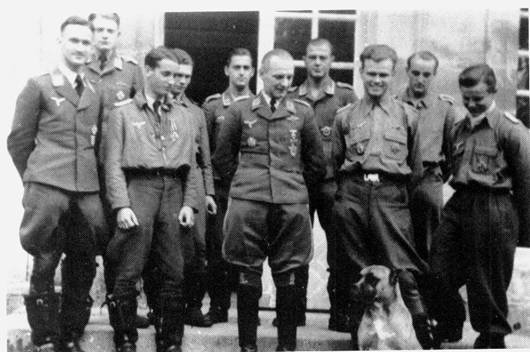 In 1942: Front row, on the far left is Oberleutnant Fritz Schröter next to Poldi Wenger. Behind the dog is Frank Liesendahl with Erhard Nippa on right.