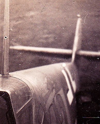 Damage to Poldi's plane -- holes in the wing and in the antenna