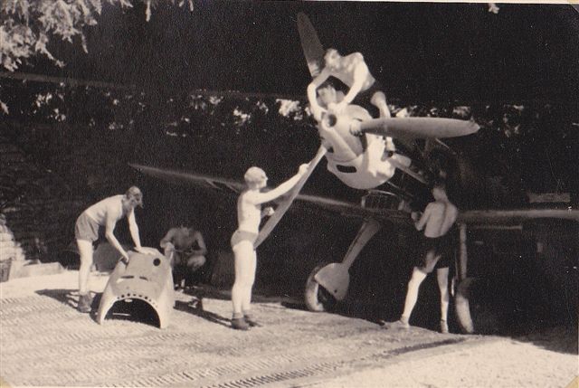 "Ground staff" at work in the intense heat at Cazau in Southern France, July 1941