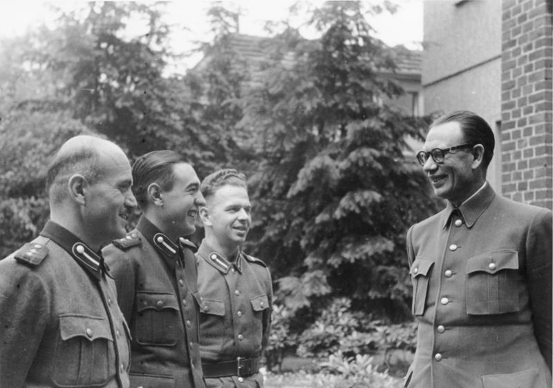 General Andrei Vlasov speaks to Soviet collaborators wearing the uniform of the German Wehrmacht