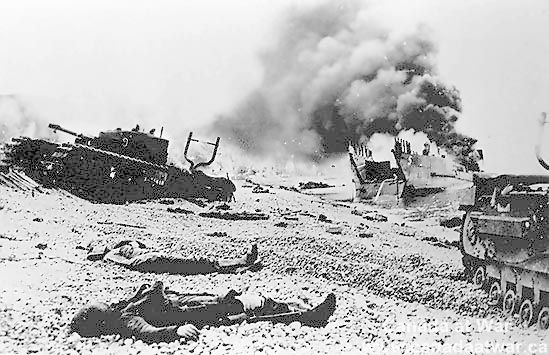 What Poldi Saw: Destroyed landing craft and tanks, along with dead Canadian troops at water's edge on Dieppe Beach.