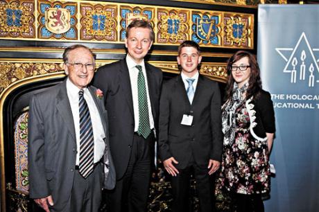HET chairman Lord Janner, Education Secretary Michael Gove, Lessons from Auschwitz student ambassadors Jack Boyce and Nadia Caney