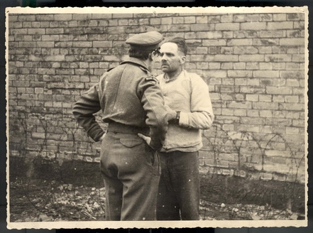 Rudolf Hoess being abused while in British captivity.