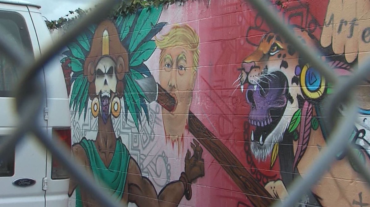 School mural - Trump beheaded by Aztlan with spear through his mouth