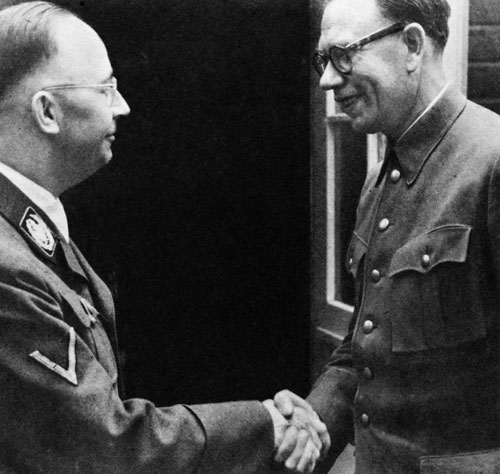 Reichsführer SS Heinrich Himmler shakes hands with captive Russian General Andrey Vlasov. 