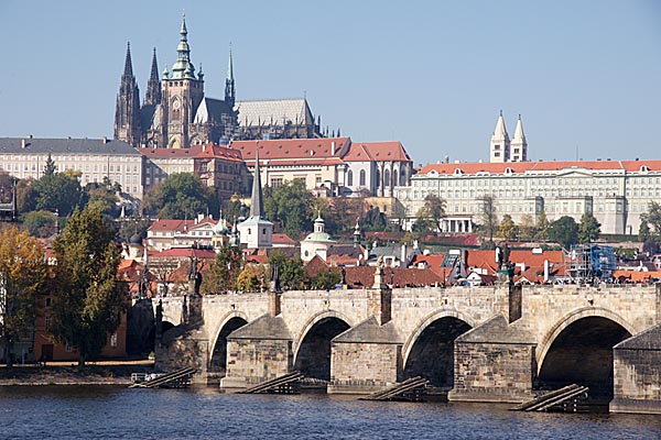 Prague Castle complex and the St. Charles Bridge crossing the Moldau river. 