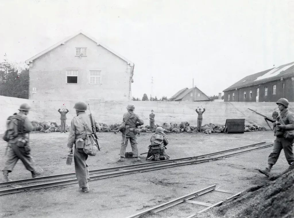 SS camp guards being shot after surrendering to U.S. troops at Dachau