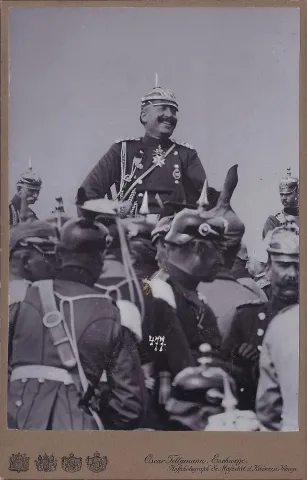 Kaiser Wilhelm II enjoying a light moment with his officers.