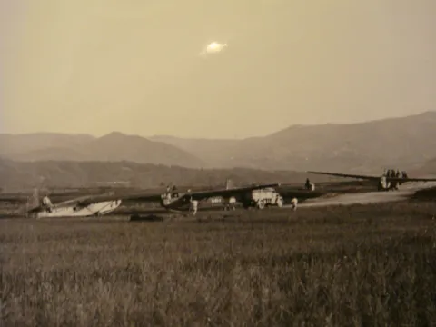 Gliders that brought airborne troops grouped at the lower fields around Drvar