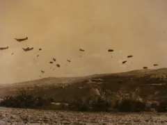 Ju 52s dropping paratroopers.
